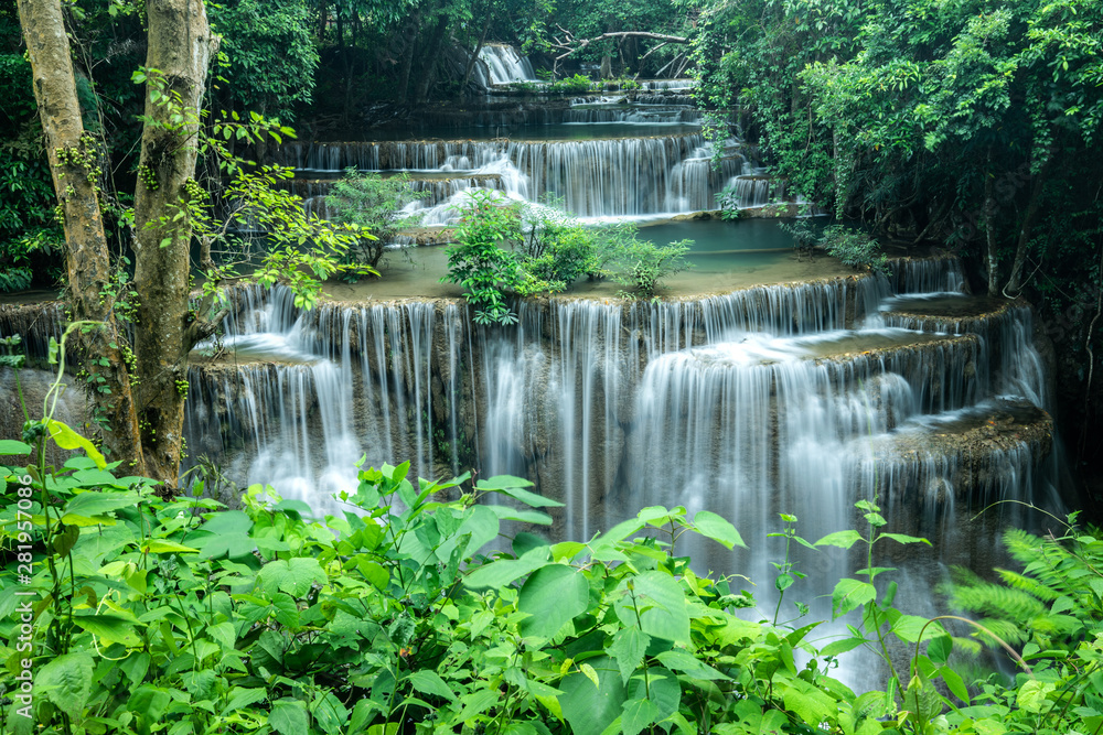 A beautiful waterfall among the forest in Thailand. It is the best place for camping to feel fresh air, green leaves and peaceful nature during holiday. A beautiful waterfall among the forest in Thailand. It is the best place for camping to feel fresh air, green leaves and peaceful nature during holiday.