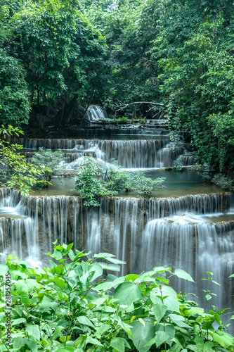 A beautiful waterfall among the forest in Thailand. It is the best place for camping to feel fresh air  green leaves and peaceful nature during holiday. 