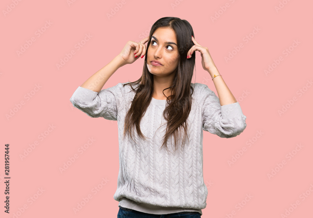 Young hispanic brunette woman having doubts and thinking over isolated background Young hispanic brunette woman having doubts and thinking over isolated background