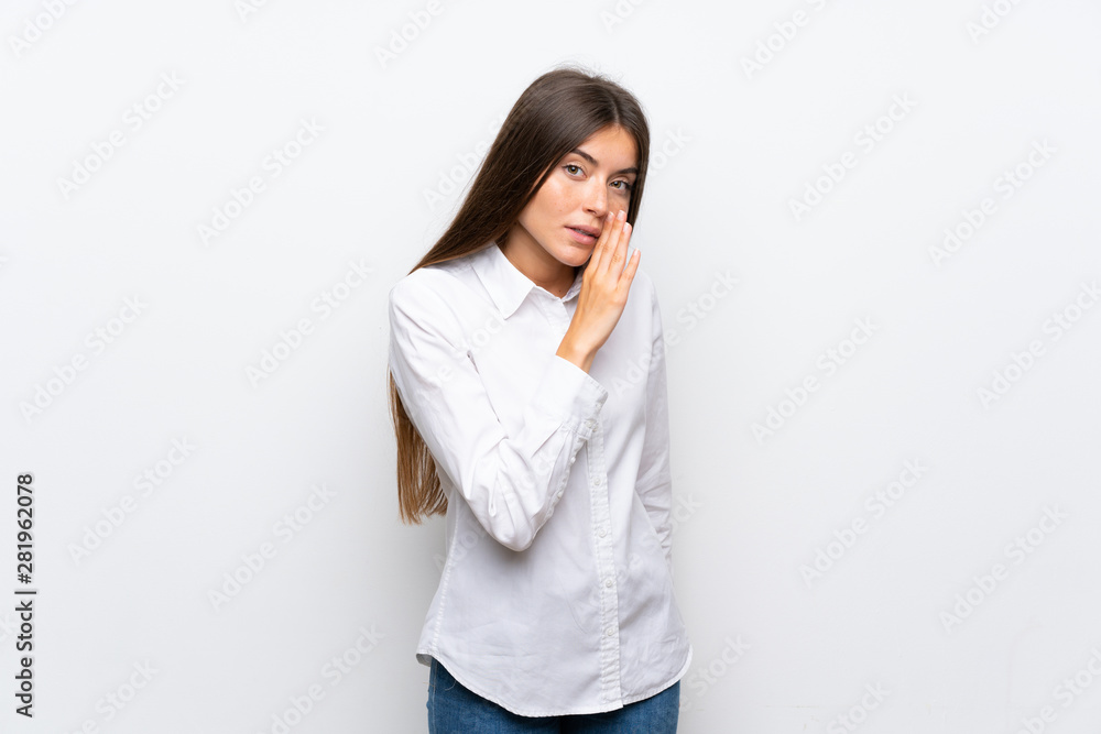 Young woman over isolated white background whispering something Young woman over isolated white background whispering something
