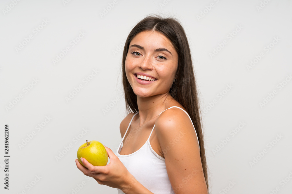 Pretty young woman with an apple