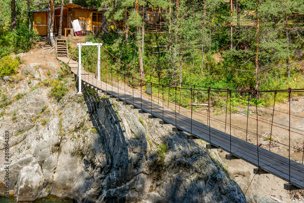 Suspended pedestrian bridge over the river Chemal Suspended pedestrian bridge over the river Chemal