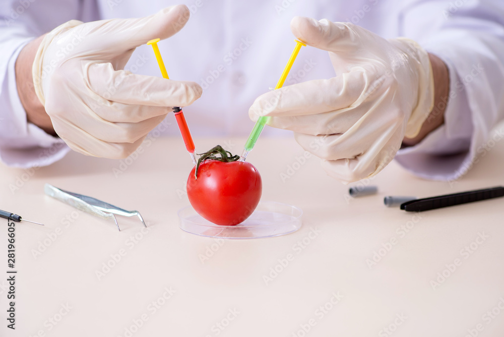 Male nutrition expert testing food products in lab Male nutrition expert testing food products in lab