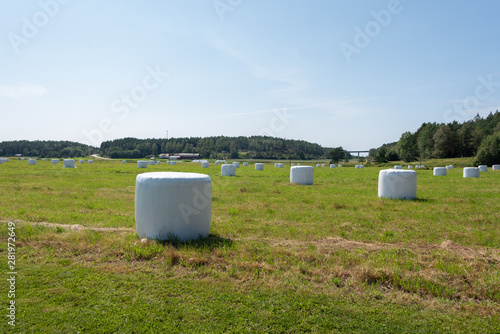 View of white hay bales