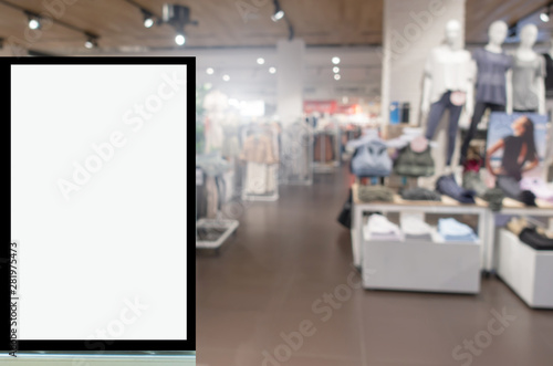 Wallpaper Mural blank showcase billboard or advertising light box for your text message or media content with blurred image popular women fashion clothes shop showcase in shopping mall, commercial, marketing concept Torontodigital.ca
