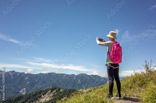Asian climbing woman take pictures