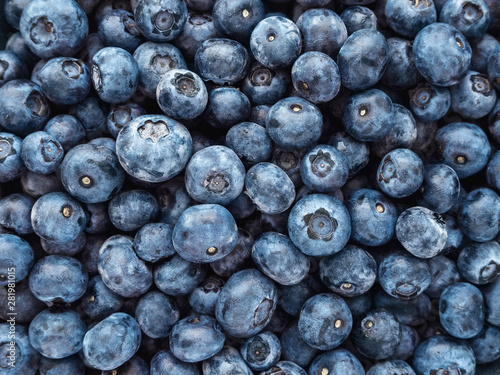 a lot of ripe blueberries closeup - background