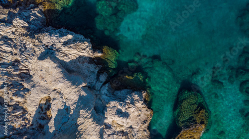Turquoise Water and Rocky Shore on Greek Island, Aerial top Down View © marcin jucha