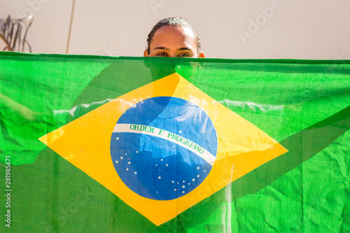 Brazilian Young Black Man Student with Brazil Flag.