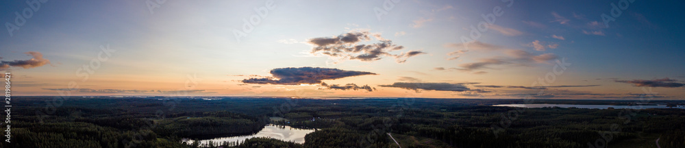 Sunset drone panorama over the forest and lakes in North Karelia, Finland