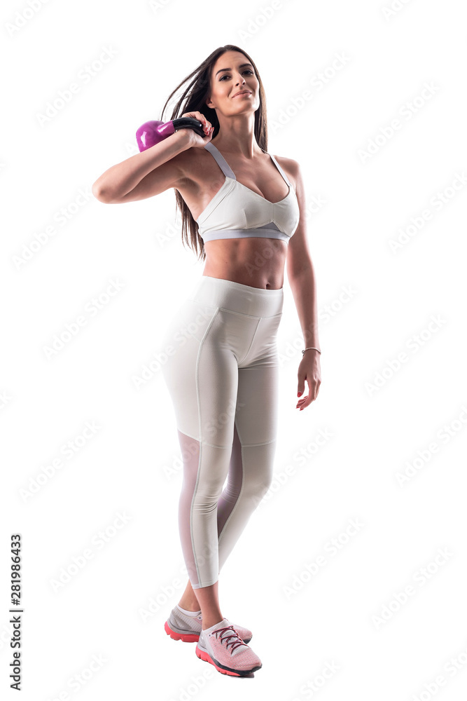 Full Body Shot Of A Young Adult Woman In A Black Workout Outfit As She  Stretches Out In A Yoga Pose High-Res Stock Photo - Getty Images