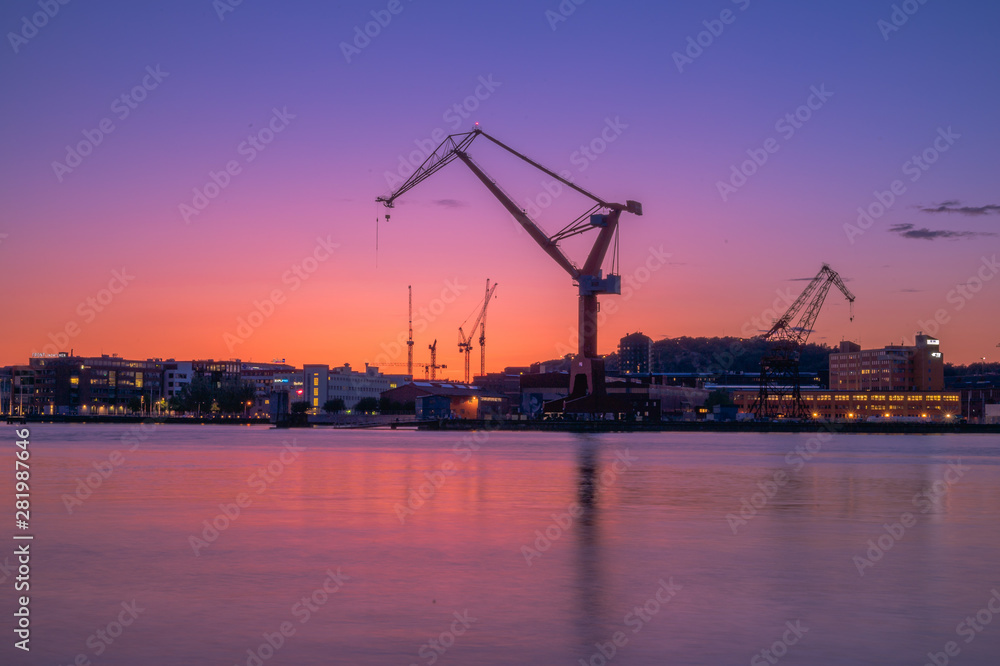 cranes at sunset