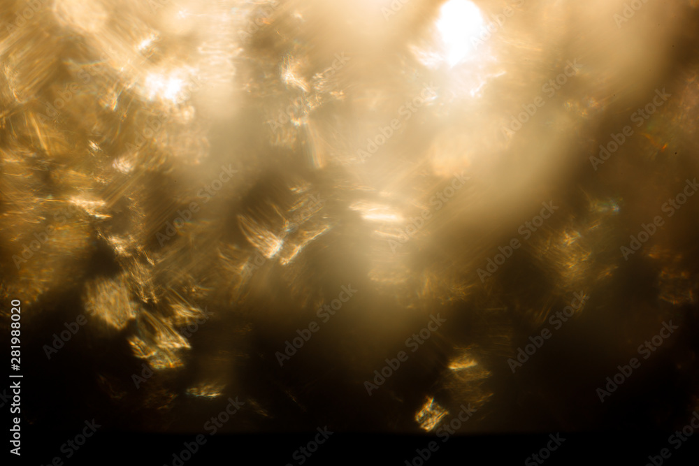 Easy to add lens flare effects for overlay designs or screen blending mode to make high-quality images. Abstract sun burst, digital flare, iridescent glare over black background.