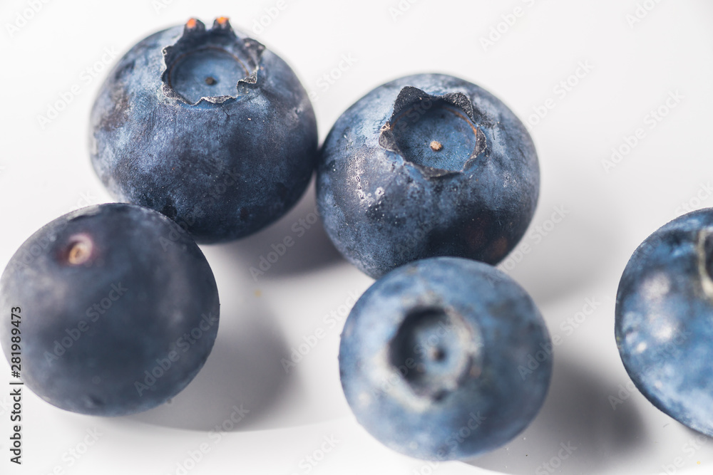 Many red and white berry.Good tasting blueberries with full of healthy vitamins..A good vegan meal. Set of tasty blueberries on white background, closeup. Many red and white berry.Good tasting blueberries with full of healthy vitamins..A good vegan meal. Set of tasty blueberries on white background, closeup.