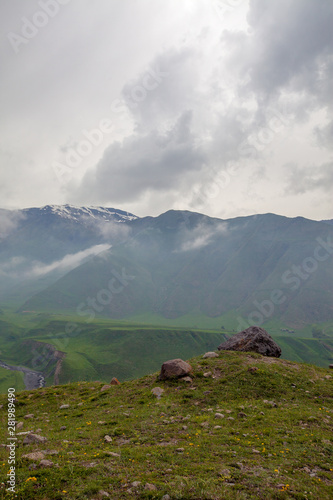 Mountains rocks landscape with cloudy dramatic sky