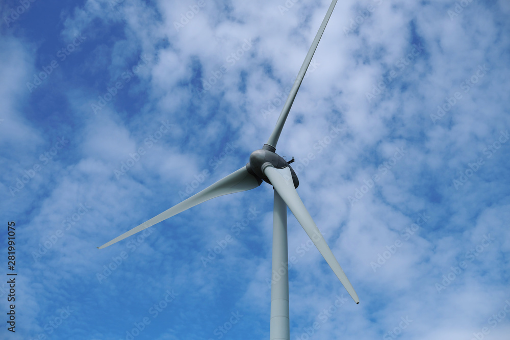 Wind wheel and blue sky and white clouds - Stockphoto Wind wheel and blue sky and white clouds - Stockphoto