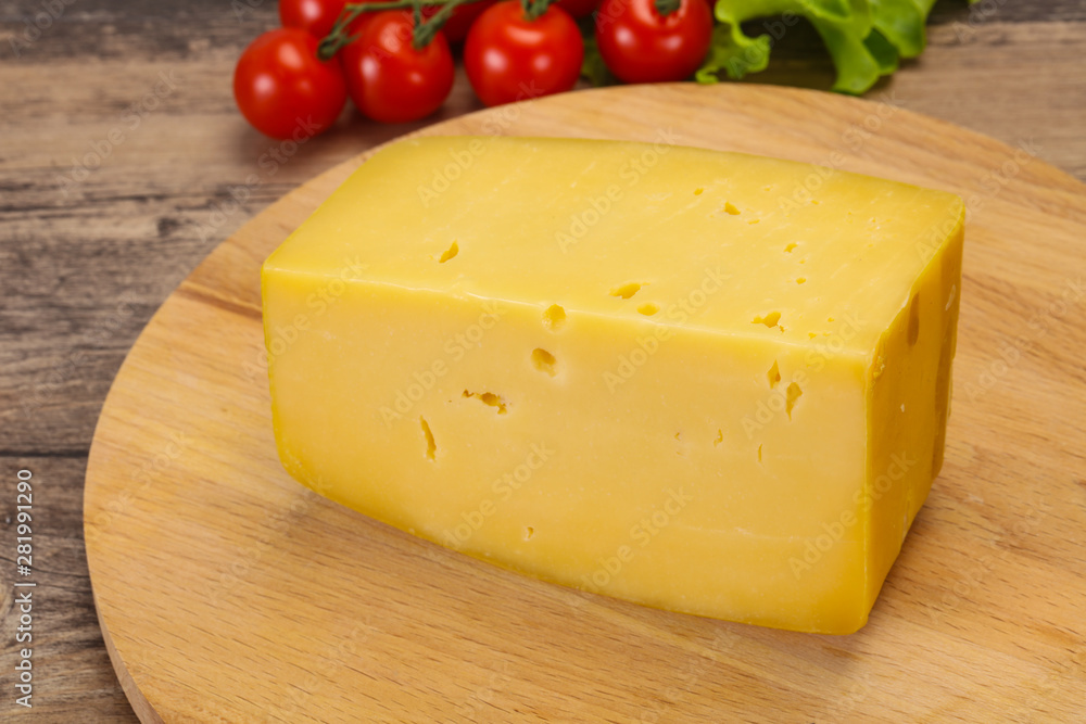 Hard yellow tasty cheese brick Hard yellow tasty cheese brick