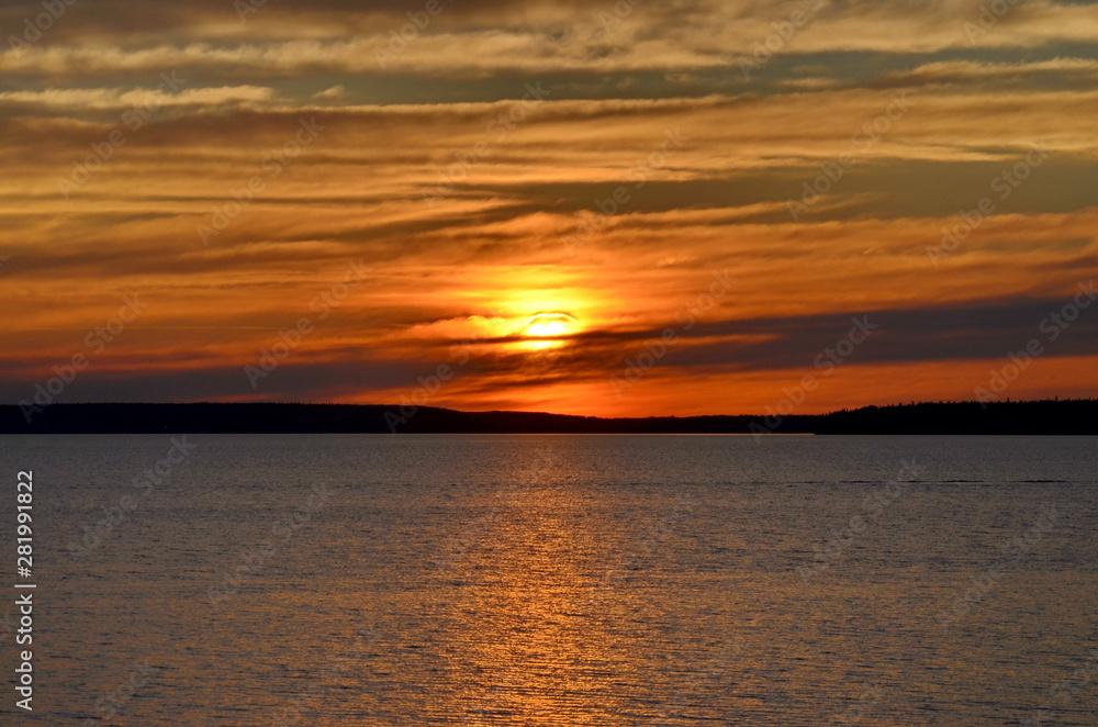 Sunset over water in Saskatchewan, Canada