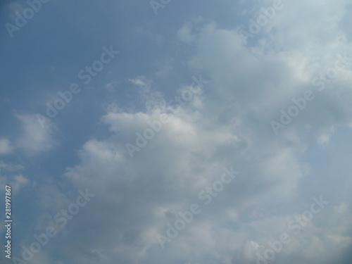 a white cloud flying along the blue sky © Сергій Правда