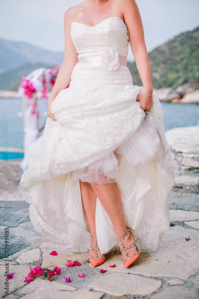 bride in white dress on the beach bride in white dress on the beach
