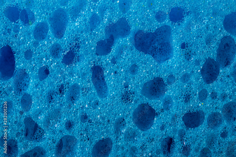 Blue sponge texture macro background, copy space Blue sponge texture macro background, copy space