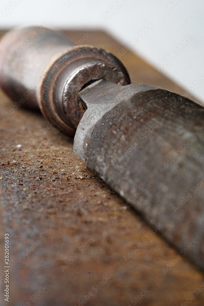 Metal file on rusty steel