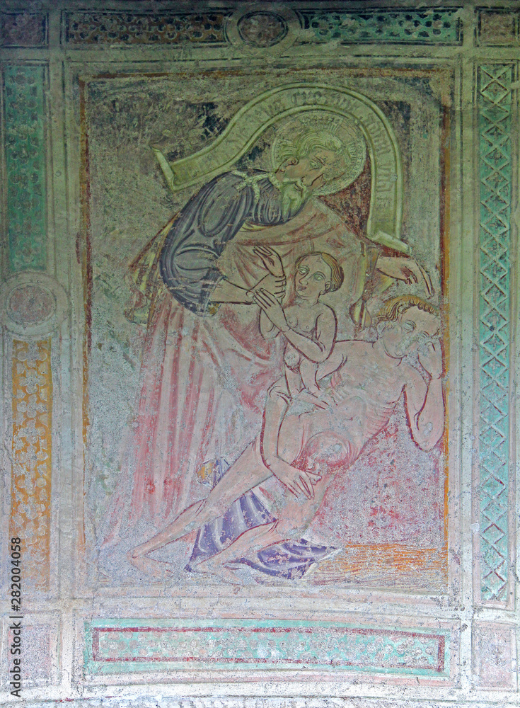 Dio crea Eva da una costola di Adamo; affresco esterno della chiesa di San Procolo a Naturno