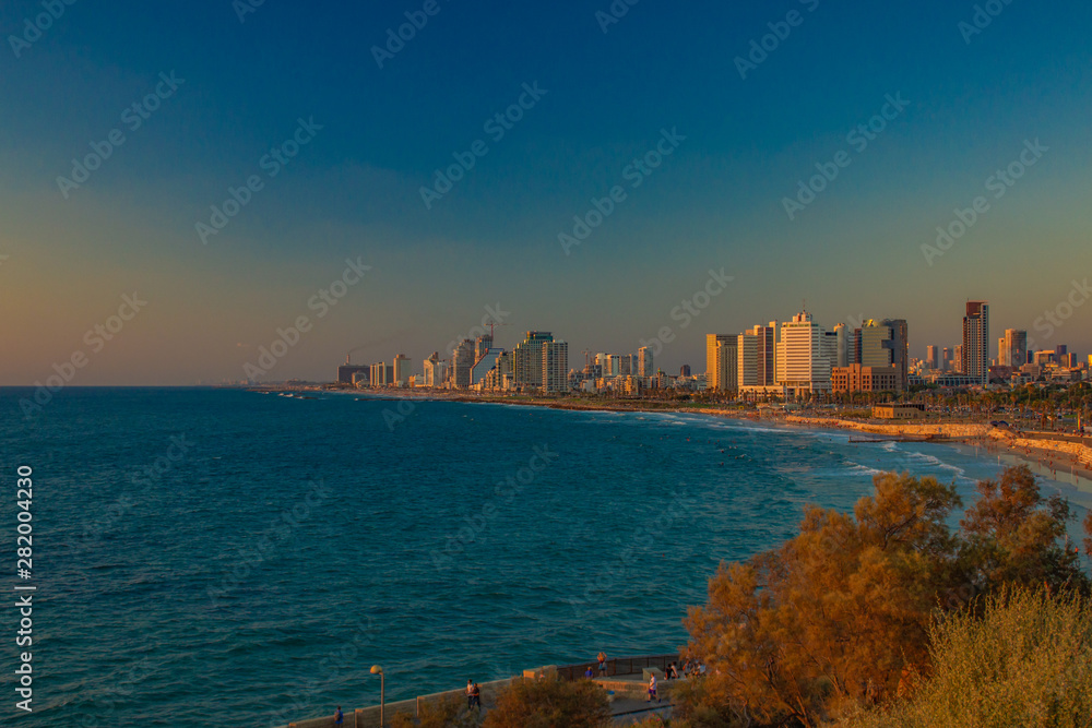 evening twilight landmark travel destination photography of Tel Aviv capital city of Israel landscape panorama with Mediterranean sea beach waterfront 