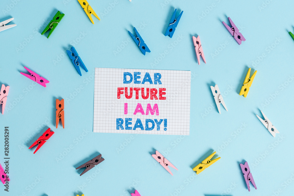 Handwriting text writing Dear Future I Am Ready. Conceptual photo suitable state for action or situation being fully prepared Colored clothespin rectangle shaped reminder paper light blue background