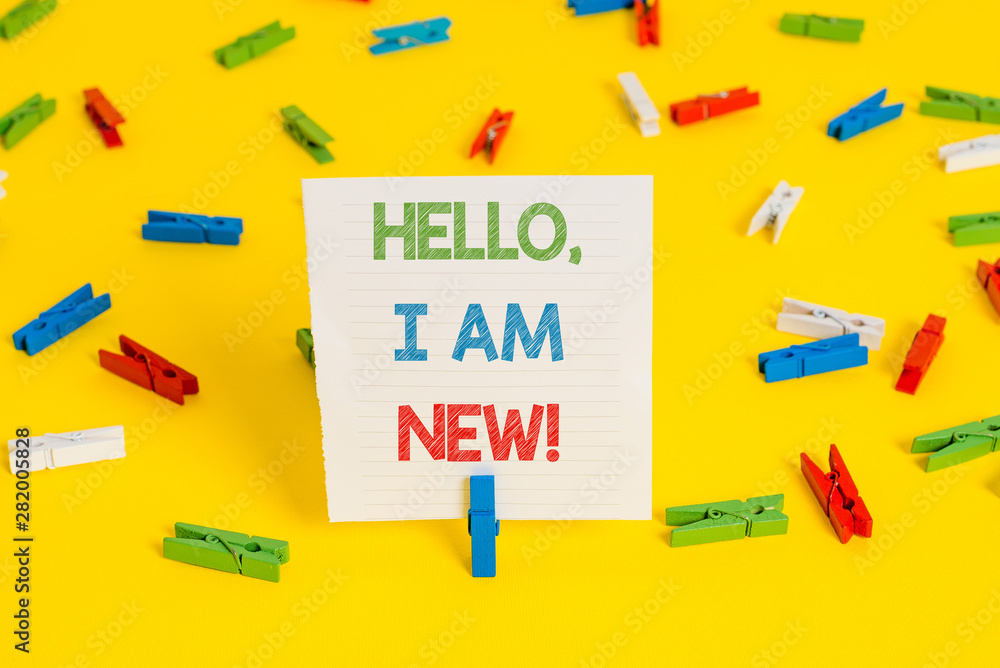 Conceptual hand writing showing Hello I Am New. Concept meaning used as greeting or to begin telephone conversation Conceptual hand writing showing Hello I Am New. Concept meaning used as greeting or to begin telephone conversation