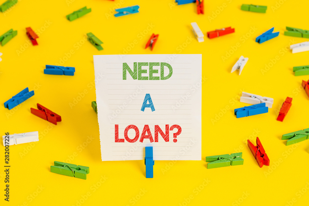 Conceptual hand writing showing Need A Loan question. Concept meaning amount of money that is borrowed often from bank Conceptual hand writing showing Need A Loan question. Concept meaning amount of money that is borrowed often from bank