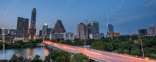 Panormaic View of Austin Skyline At Dawn with City Lights On © porqueno