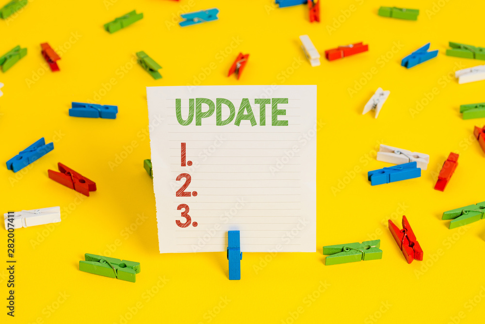 Conceptual hand writing showing UPDATE. Concept meaning make something more modern or up to date like software program Conceptual hand writing showing UPDATE. Concept meaning make something more modern or up to date like software program