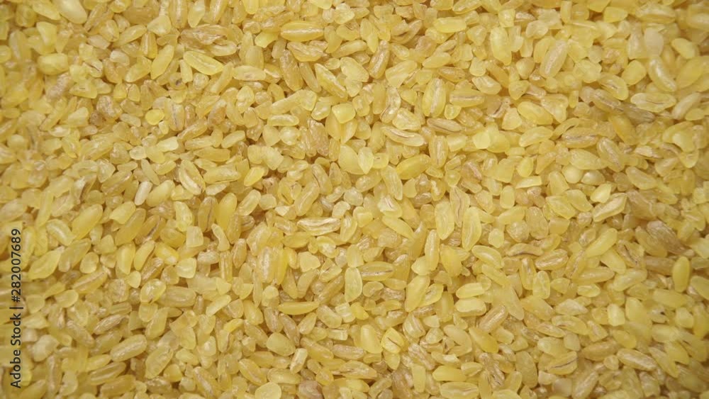 Bulgur wheat cereal food as background. Top view. Healthy diet Bulgur wheat cereal food as background. Top view. Healthy diet