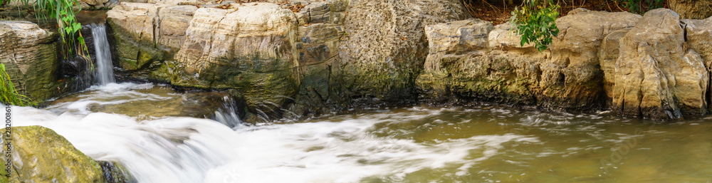 Valley water and rock., waterfall in the forest, The water whirled around the rocks Valley water and rock., waterfall in the forest, The water whirled around the rocks