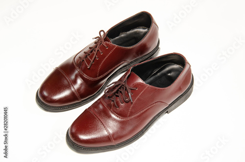 Brown leather shoes photos Put on a white background