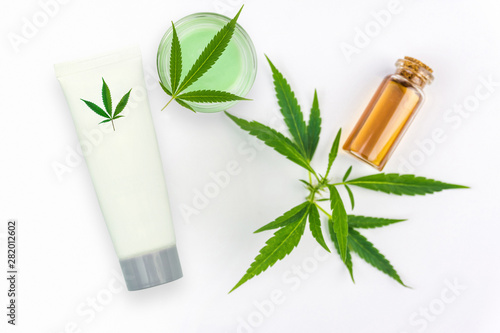 Photography CBD Cannabis Hemp topical cream and oil balm with cannabis leaf