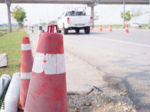 Traffic cones and " Diversion" sign outside a construction zone