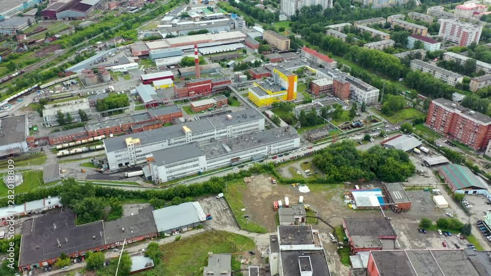 Aerial flying above industrial park also known as industrial region industrial zone usually located on edges of or outside residential area of city normally provided with good transportation access 4k Aerial flying above industrial park also known as industrial region industrial zone usually located on edges of or outside residential area of city normally provided with good transportation access 4k