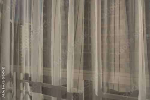 Modern high rise room balcony white gauze curtain translucent backlit background