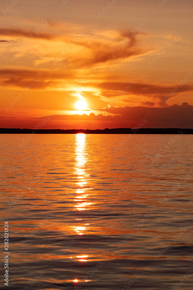 Fototapeta premium Sunset on the Amur river embankment in Khabarovsk, Russia.