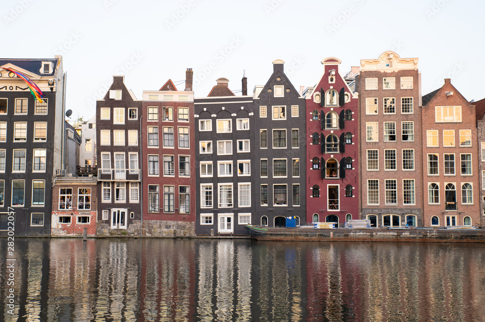 AMSTERDAM-HOLLAND- JULY 29, 2019: Amsterdam is the Netherlands’ capital, known for its artistic heritage, elaborate canal system and narrow houses with gabled facades