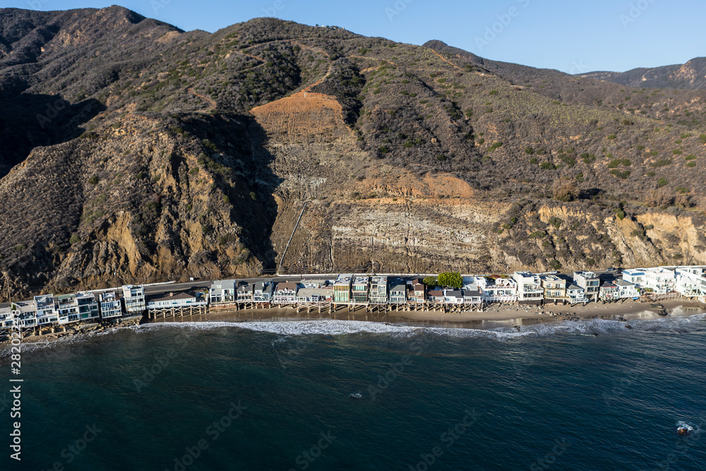 Aerial of beach homes and Big Rock Mesa landslide zone in the Malibu neighborhood of Los Angeles County, California.