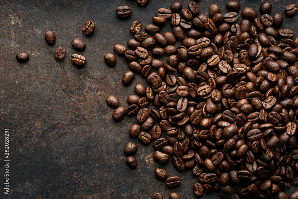 Coffee, coffee beans on the table, dark background, top view , Free space for text input Coffee, coffee beans on the table, dark background, top view , Free space for text input