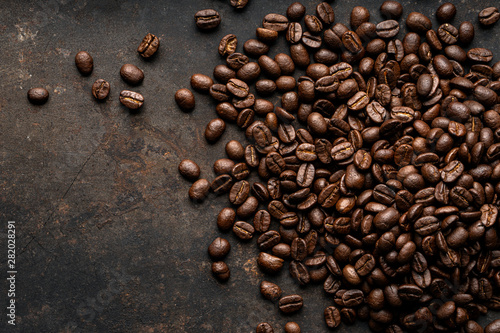 Coffee, coffee beans on the table, dark background, top view , Free space for text input