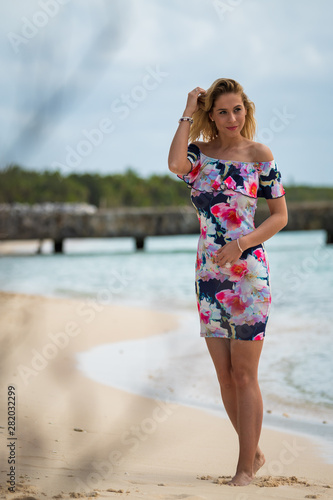 Blonde girl on the beach of the Mexican Caribbean photo