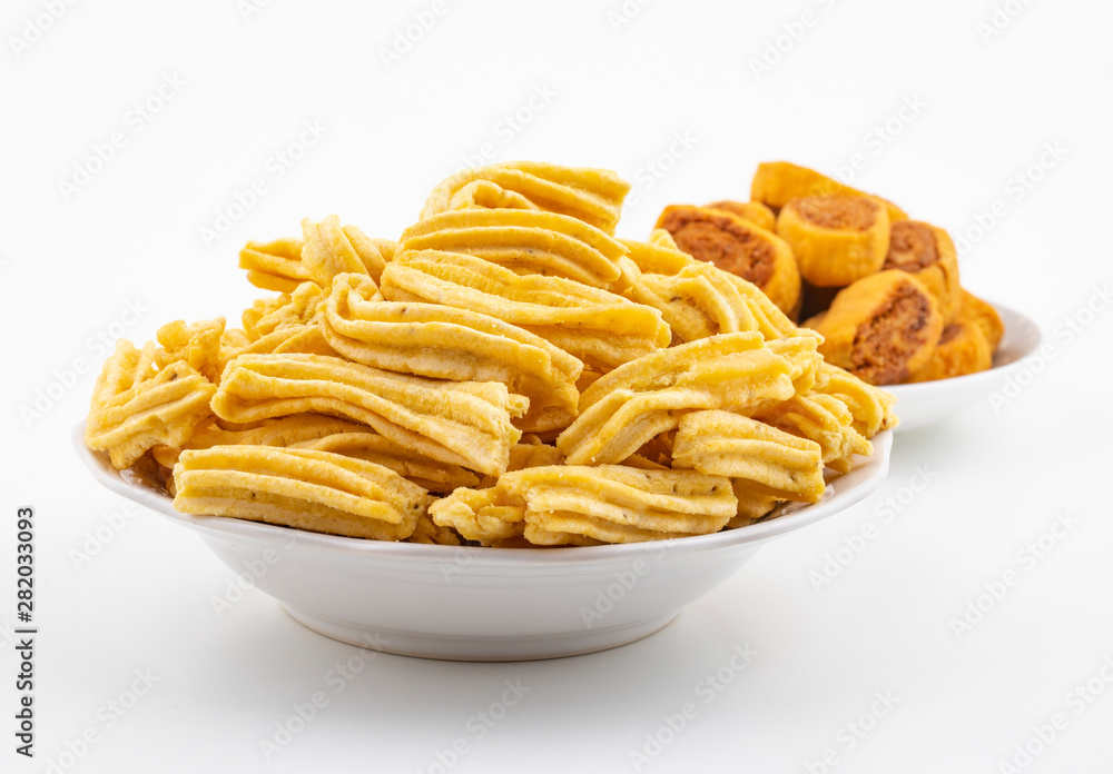 Indian Traditional Spicy Snack Ghatiya With Bhakarwadi Also Know as Ganthiya, Papdi, Gathiya, Bakarwadi, Bakarvadi, Bakar Vadi or Bakar Wadi Are Deep Fried Snack Made From Chickpea Flour. Indian Traditional Spicy Snack Ghatiya With Bhakarwadi Also Know as Ganthiya, Papdi, Gathiya, Bakarwadi, Bakarvadi, Bakar Vadi or Bakar Wadi Are Deep Fried Snack Made From Chickpea Flour.