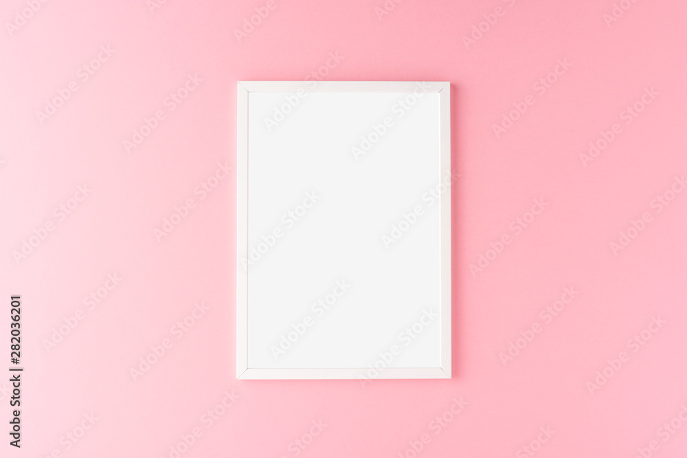 White photo frame with copyspace on pink background White photo frame with copyspace on pink background
