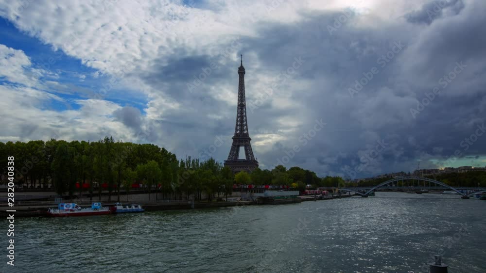 Lockdown Time-Lapse: Boat With Tourists Travelling in the Waters of Paris With View of Eiffel Tower Lockdown Time-Lapse: Boat With Tourists Travelling in the Waters of Paris With View of Eiffel Tower