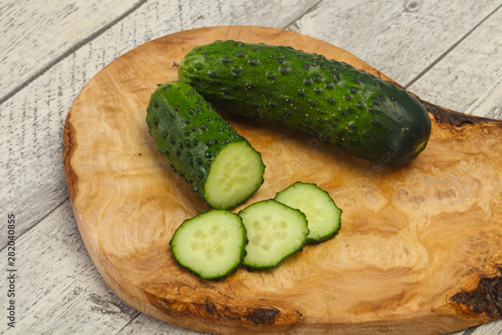 Ripe fresh green two cucumbers Ripe fresh green two cucumbers